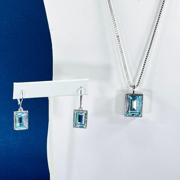 Swarovski Jewelry - Swarovski Blue Pendant and Earrings Set Rhodium Setting Reversible to Clear